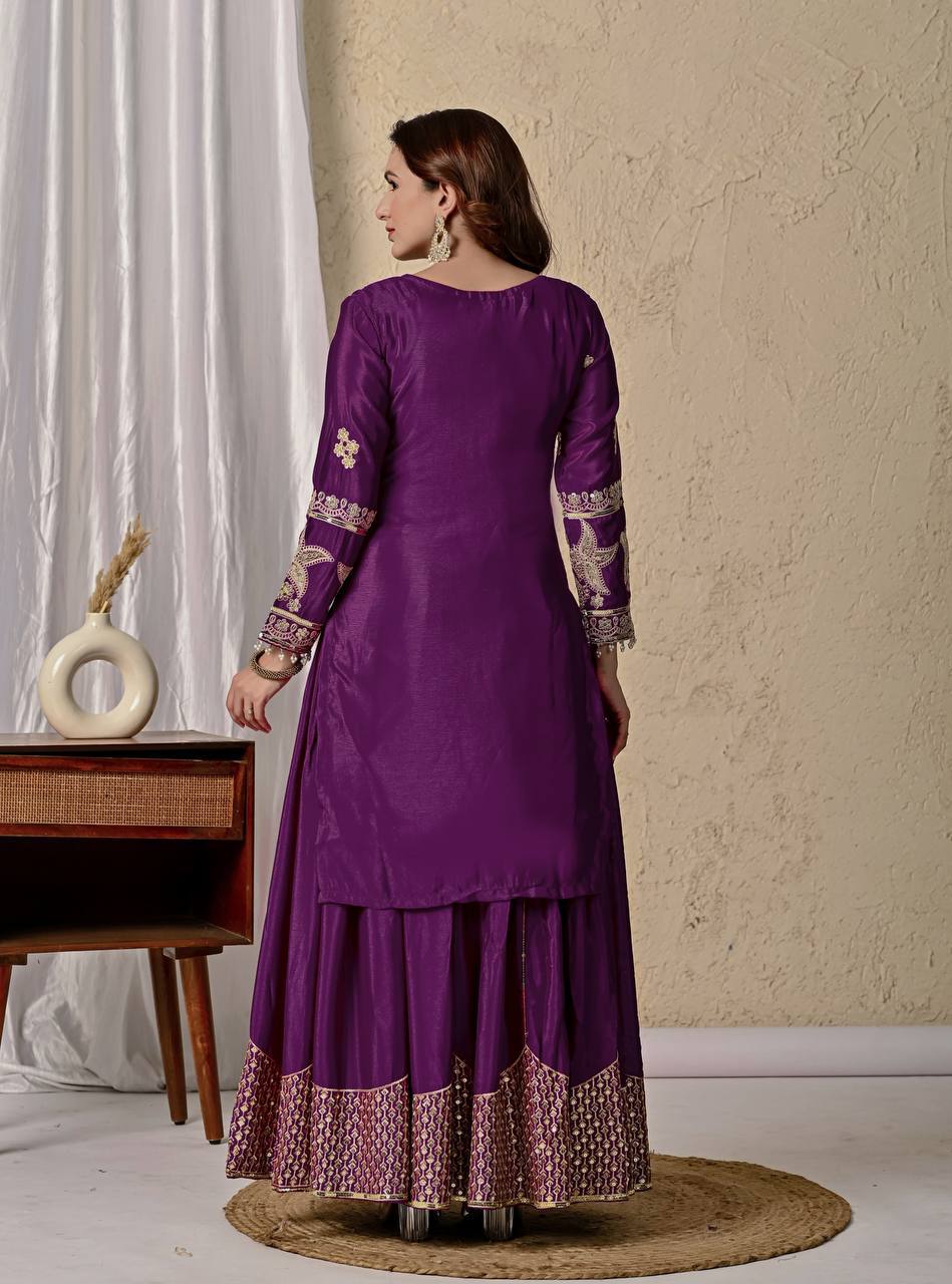 Regal Wine Purple Kurti and Flared Palazzo Suit Set Embellished with Intricate Floral Zari and Mirror Work